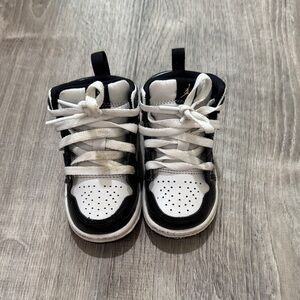 Jordan’s Black and White High-Top Sneakers